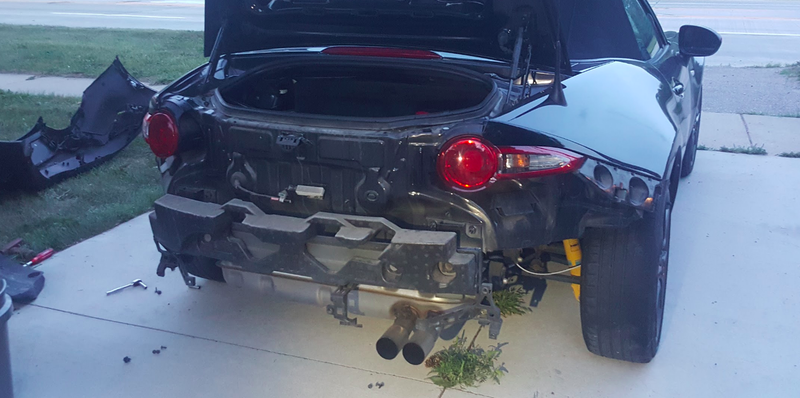 Illustration for article titled Installing a Trailer Hitch on a Mazda Miata Is Incredibly Easy and Fixes the Car's Biggest Flaw